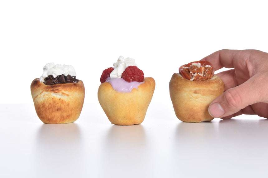 Wolf’em Stick marshmallow roasting stick with biscuit cup attachment used to make Wolf’ems a fun tasty treat better than s’mores.  Great for camping, backyard fire pits, family reunions, and gifts.